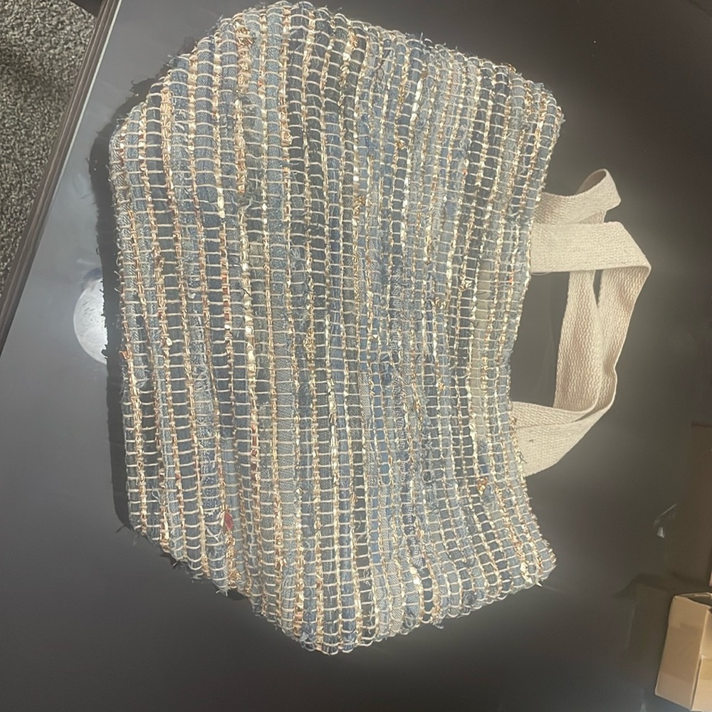 Denim and golden woven tote bag